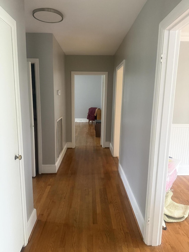 240 Clifton Heights Rd, Newport, TN 37821 - hall featuring baseboards, visible vents, and wood finished floors