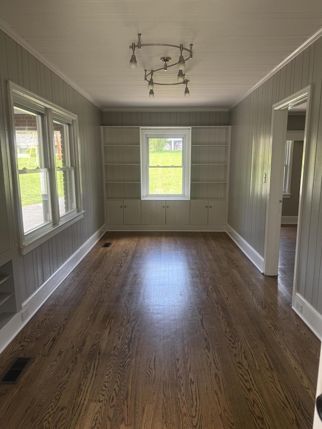 240 Clifton Heights Rd, Newport, TN 37821 - spare room with visible vents, ornamental molding, a healthy amount of sunlight, and dark wood finished floors