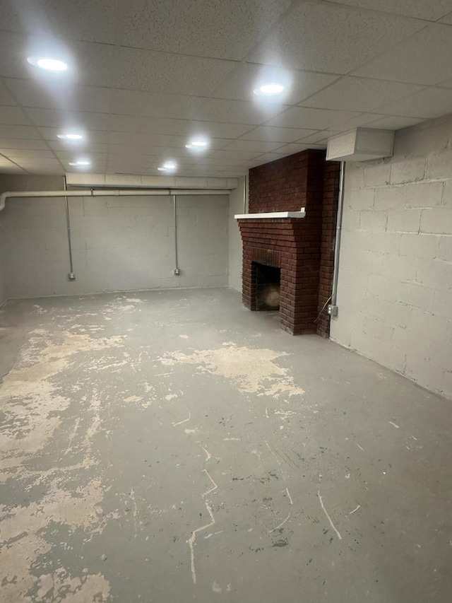 240 Clifton Heights Rd, Newport, TN 37821 - finished below grade area featuring a paneled ceiling and a brick fireplace