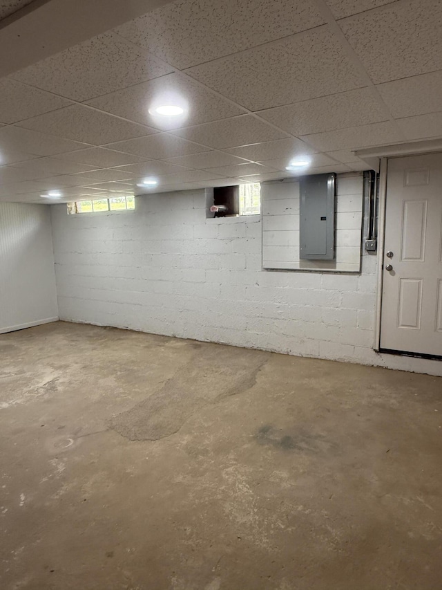 240 Clifton Heights Rd, Newport, TN 37821 - basement with plenty of natural light, electric panel, and a paneled ceiling