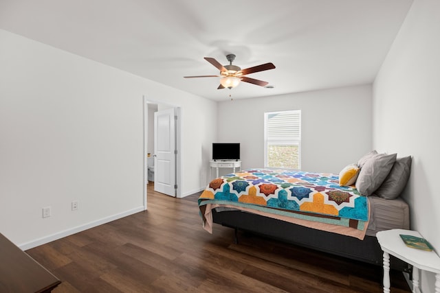 bedroom featuring dark wood finished floors, baseboards, and ceiling fan