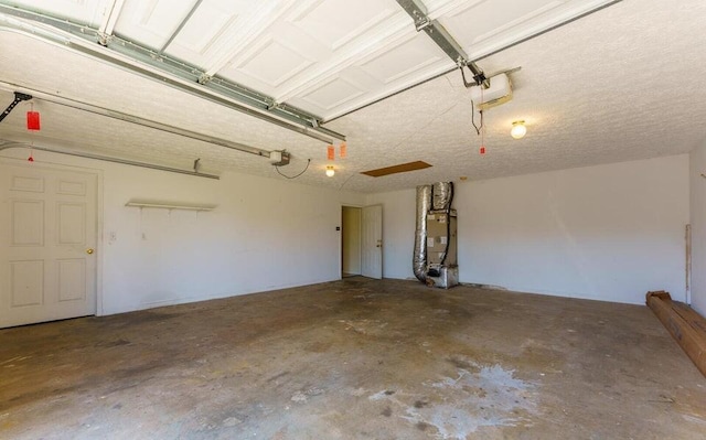 garage with heating unit and a garage door opener