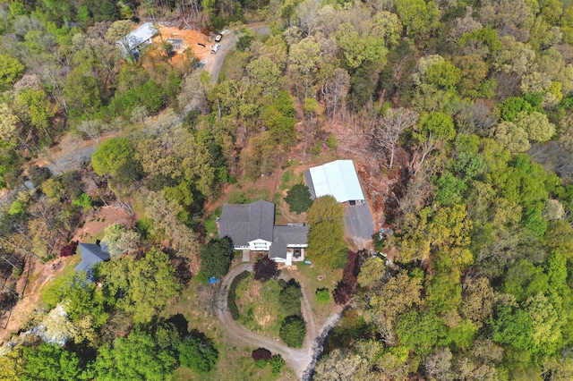 bird's eye view with a view of trees