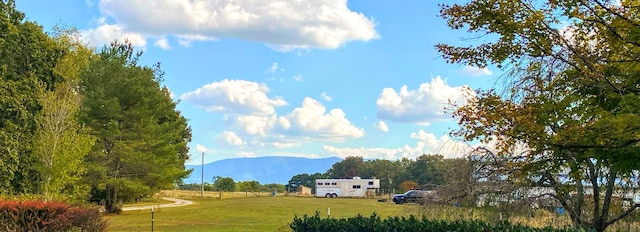 property view of mountains featuring a rural view