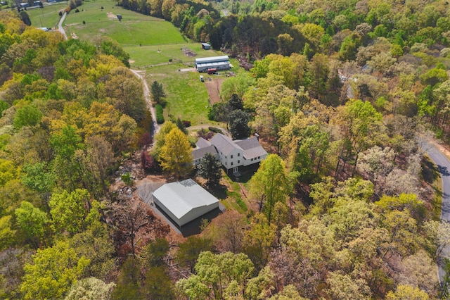 bird's eye view with a forest view