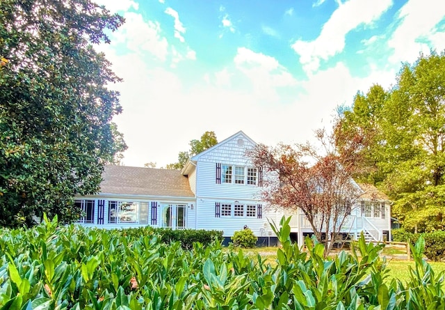 back of property with stairway