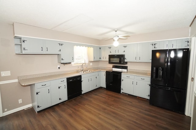 kitchen with sink, white cabinets, and black appliances