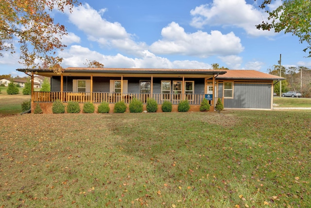 ranch-style home with a front lawn