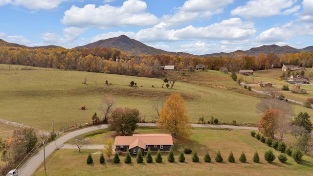 view of mountain feature with a rural view