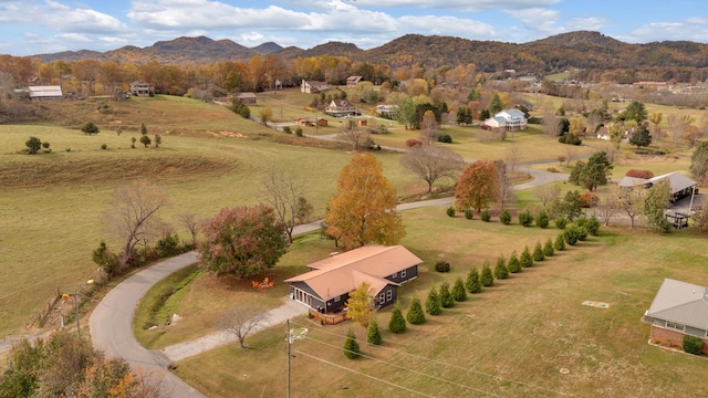 aerial view featuring a mountain view and a rural view