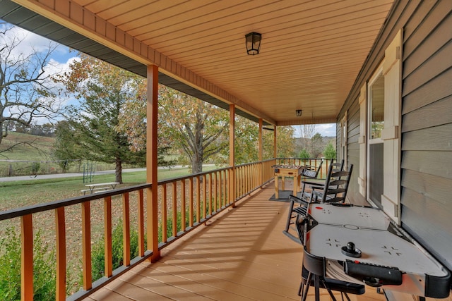 wooden terrace with covered porch