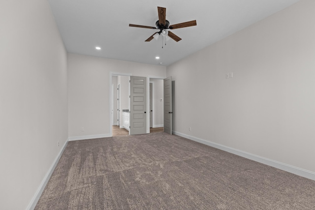 unfurnished bedroom with baseboards, ceiling fan, recessed lighting, and carpet