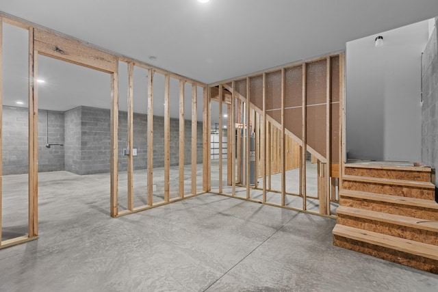 below grade area with concrete block wall