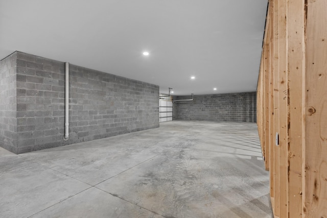 basement featuring recessed lighting