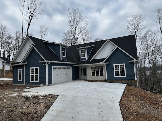 view of front of property with a garage