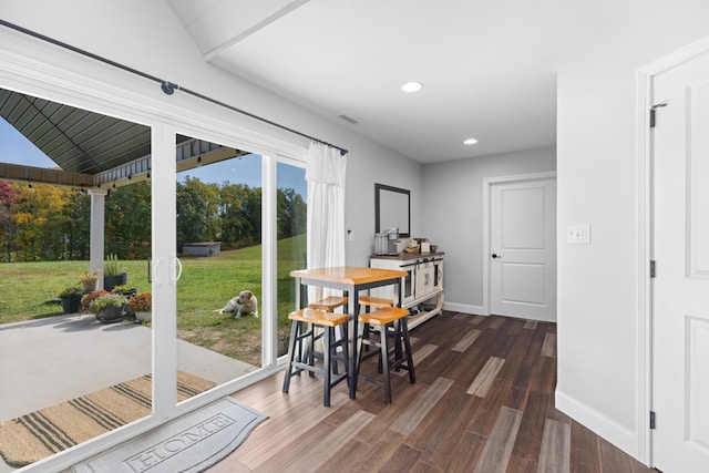 dining area with dark wood-type flooring