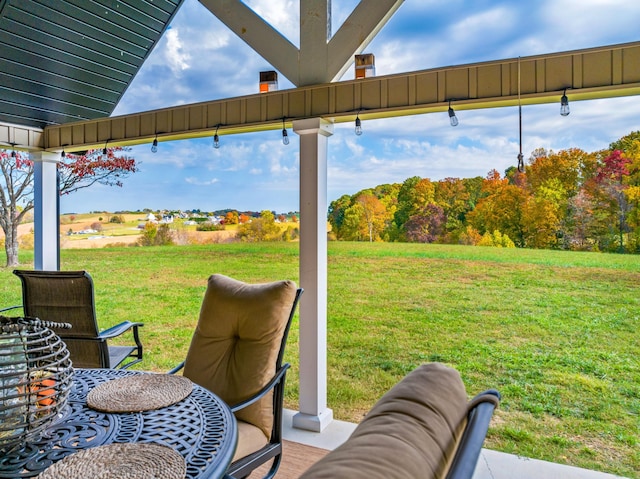 view of patio / terrace featuring a rural view