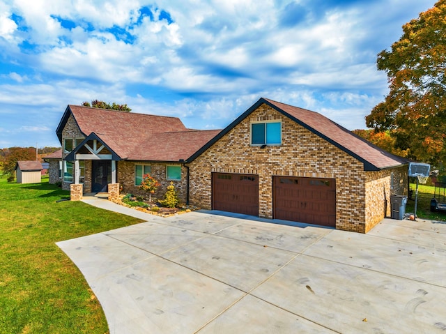 view of front facade featuring a front yard and a garage