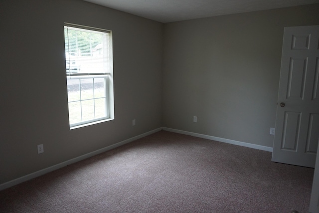 view of carpeted spare room