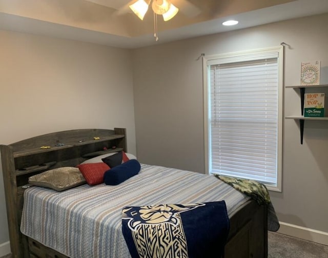 carpeted bedroom with baseboards, recessed lighting, and a ceiling fan