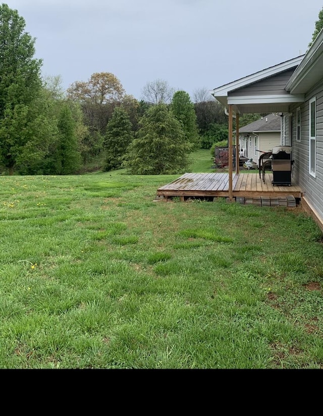 view of yard with a deck