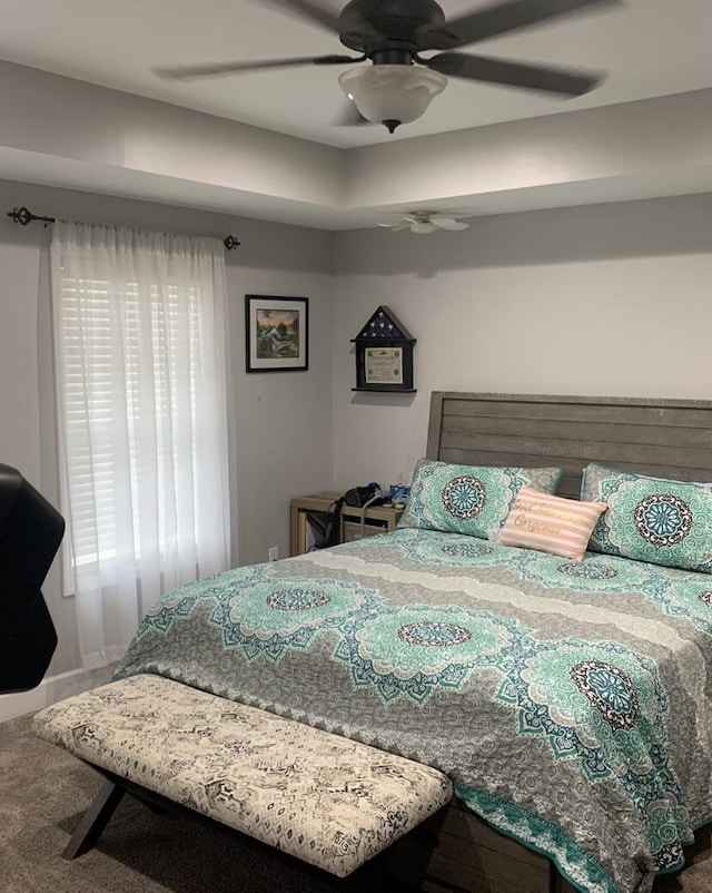 bedroom with carpet and a ceiling fan