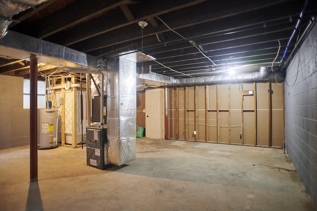 basement with electric water heater and heating unit