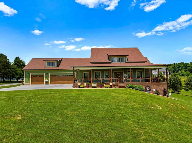 2545 Amanda Ln, Sevierville, TN 37876 - view of front facade featuring concrete driveway, a porch, and a front lawn