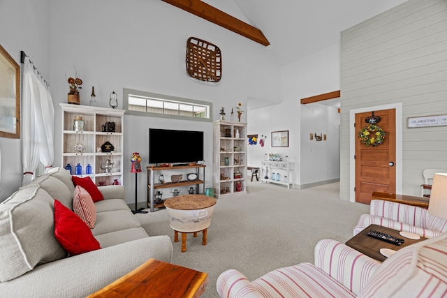 2545 Amanda Ln, Sevierville, TN 37876 - carpeted living area with high vaulted ceiling, beamed ceiling, and baseboards