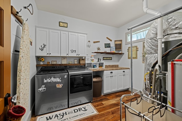 2545 Amanda Ln, Sevierville, TN 37876 - kitchen featuring washer and dryer, open shelves, dark wood finished floors, white cabinets, and dark countertops