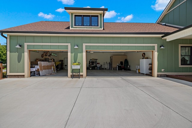 2545 Amanda Ln, Sevierville, TN 37876 - garage featuring driveway and gas water heater