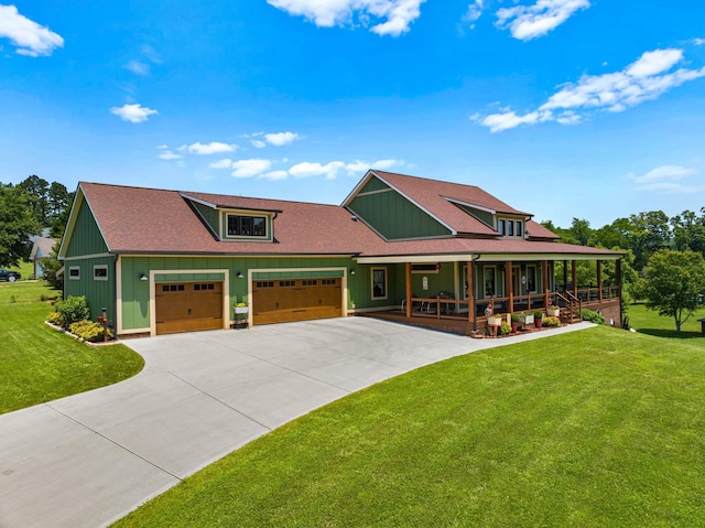 2545 Amanda Ln, Sevierville, TN 37876 - view of front of property featuring a porch, board and batten siding, a front lawn, and driveway