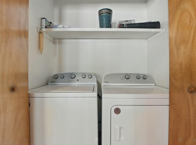 laundry area with laundry area and separate washer and dryer