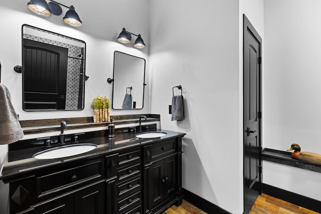 bathroom featuring hardwood / wood-style floors and vanity