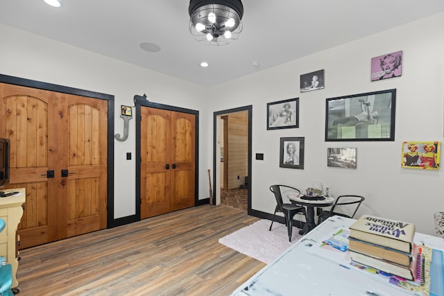 office with wood-type flooring