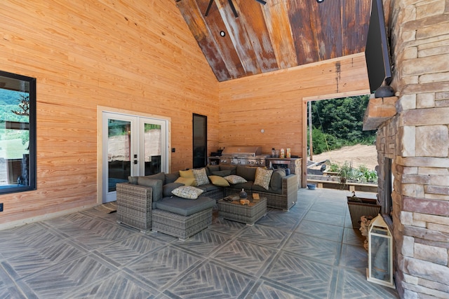 view of patio with an outdoor kitchen, area for grilling, and french doors