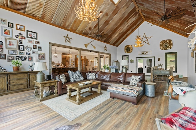 living room with french doors, high vaulted ceiling, wood-type flooring, wood ceiling, and ceiling fan with notable chandelier