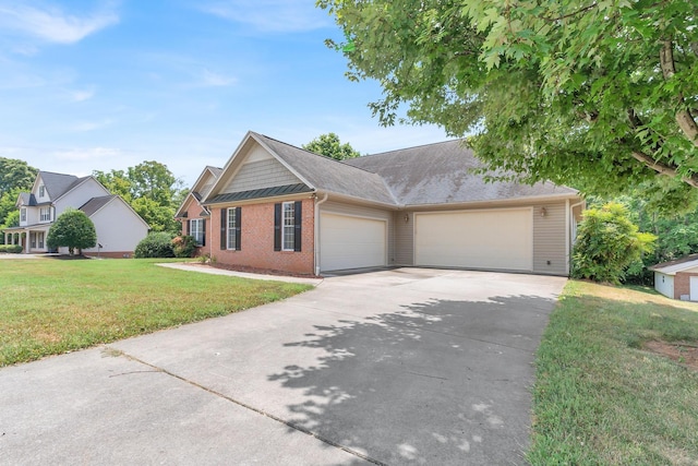 single story home featuring roof with shingles, concrete driveway, a front lawn, a garage, and brick siding