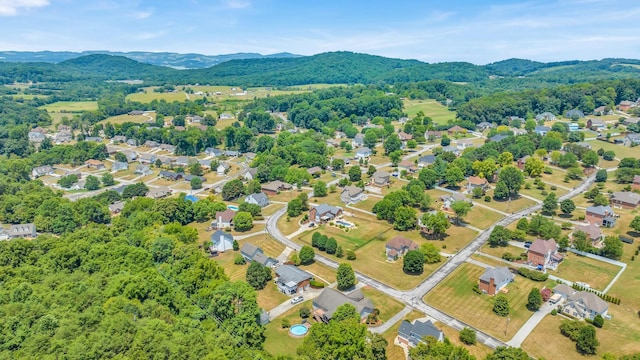 bird's eye view featuring a residential view and a mountain view