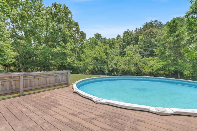 outdoor pool with a deck