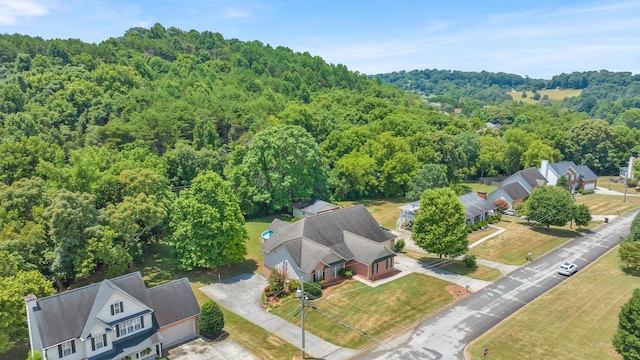 bird's eye view with a forest view