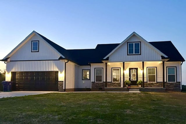 164 Logans Blf, Bean Station, TN 37708 - modern inspired farmhouse featuring a porch, a front yard, stone siding, and driveway