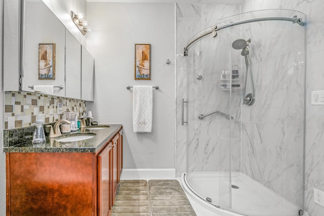 314 Sandpiper Ln, Bean Station, TN 37708 - full bath featuring a marble finish shower, tasteful backsplash, double vanity, and baseboards
