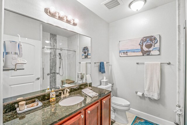314 Sandpiper Ln, Bean Station, TN 37708 - bathroom with vanity, toilet, a shower stall, and baseboards