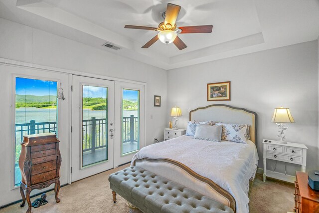 314 Sandpiper Ln, Bean Station, TN 37708 - carpeted bedroom with a tray ceiling, french doors, access to outside, and a ceiling fan