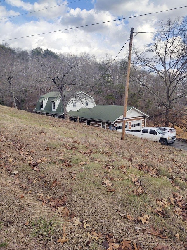 view of yard featuring a garage