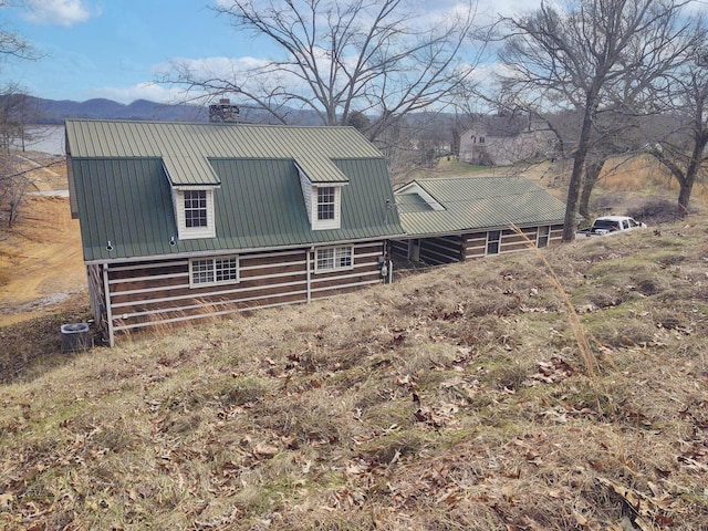 exterior space featuring a mountain view