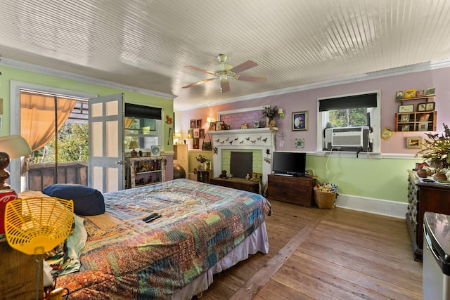 bedroom with ceiling fan, cooling unit, light wood-type flooring, and ornamental molding