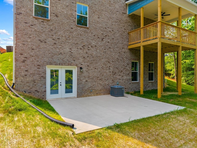 3083 Bridgewater Blvd, Morristown, TN 37814 - rear view of house with a ceiling fan, a yard, a wooden deck, a patio, and brick siding