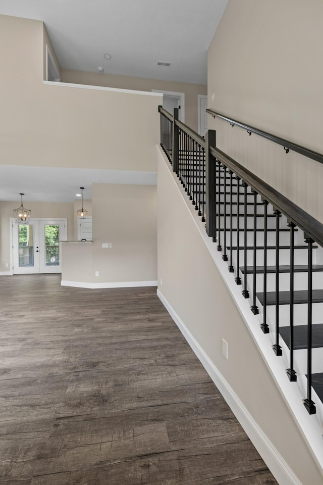 3083 Bridgewater Blvd, Morristown, TN 37814 - staircase featuring wood finished floors and a chandelier